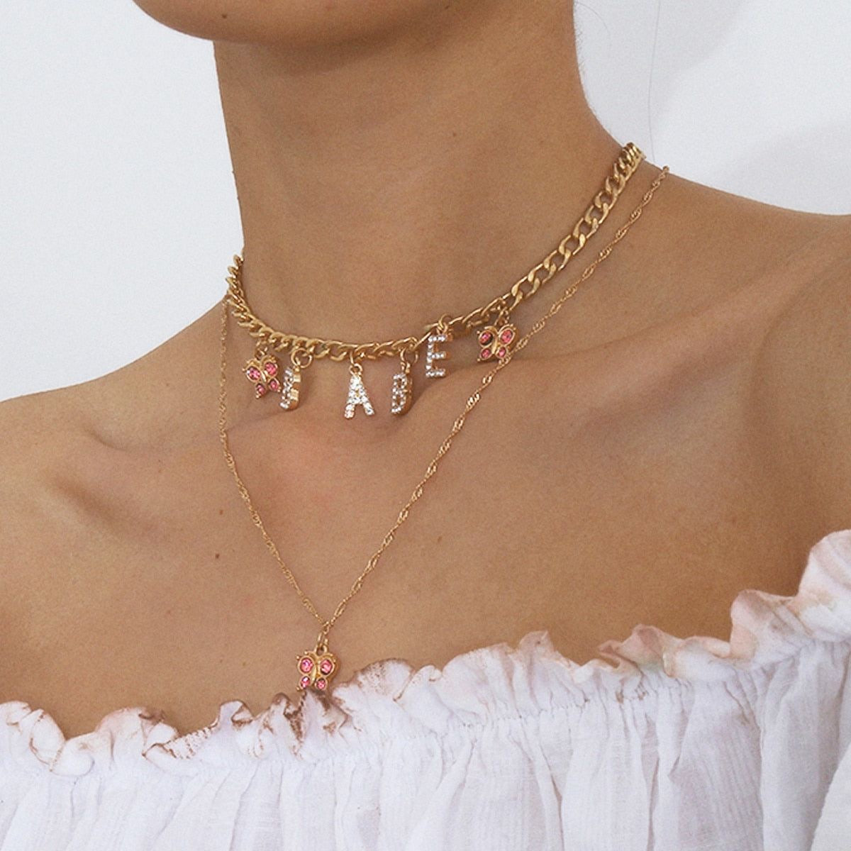Exclusive Double-layer Butterfly BABE Letters Pendant
