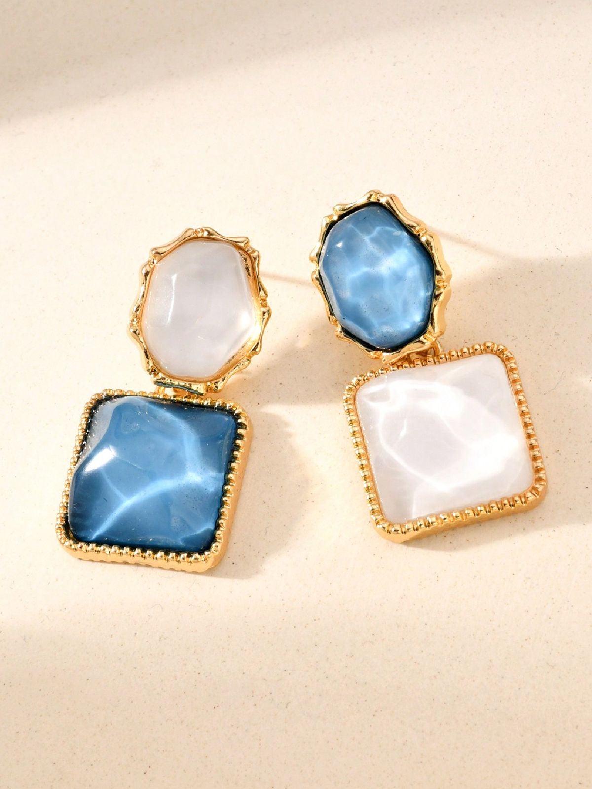 Elegant Gold Plated Blue & White Gemstone Upside Down Ripple Earrings