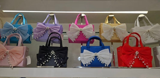 Exclusive Bow Statement Bag