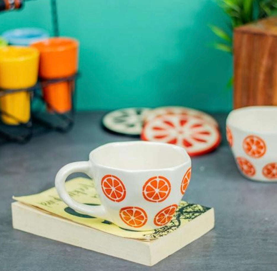 Playful Orange Print Cup & Saucer Set